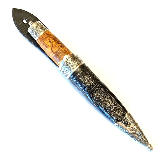 Handlaga herre kniv, Martin Elgum