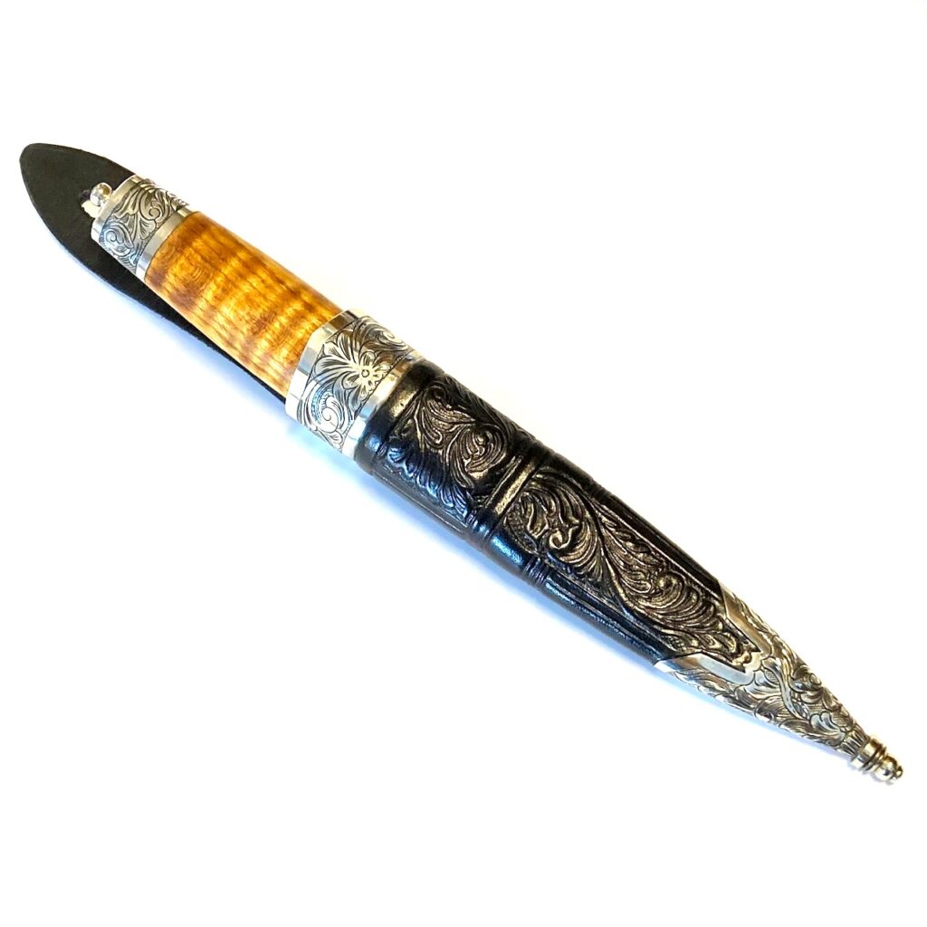 Handlaga herre kniv, Martin Elgum